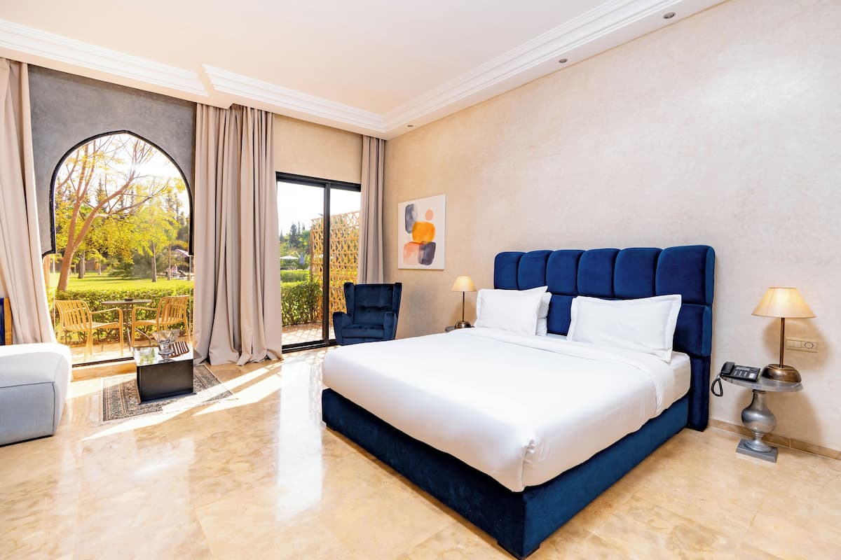 Chambre Double Deluxe, balcon, vue piscine | 1 chambre, literie de qualité supérieure, surmatelas, minibar