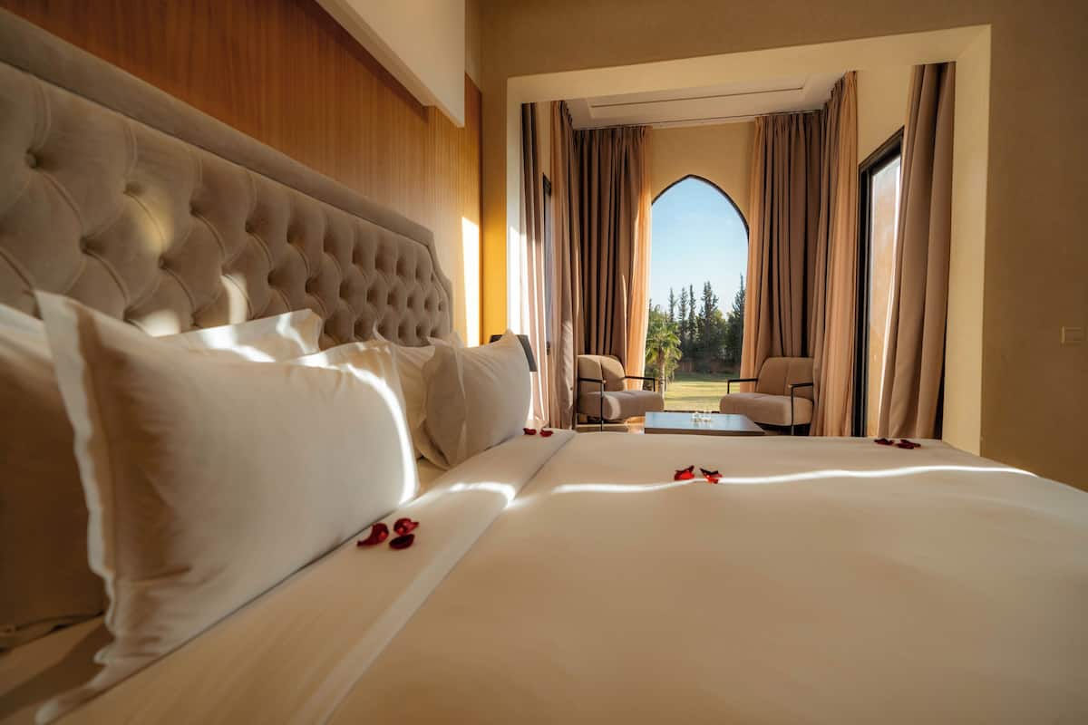 Superior Suite, Balcony, Pool View | 1 bedroom, premium bedding, pillow-top beds, minibar