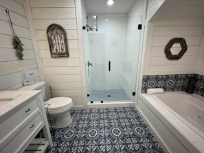 Shower, towels, soap, toilet paper