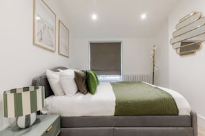 2 dormitorios, tabla de planchar con plancha, wifi y ropa de cama