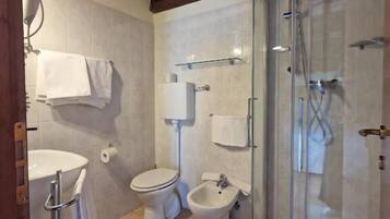 Double or Twin Room, Garden View | Bathroom | Shower, free toiletries, hair dryer, towels