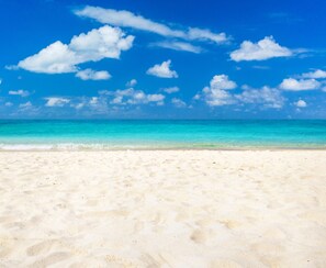A beach with white sand and a clear blue sky. - Close 2 Beach, Gated Community, Golf Cart, Pools (Santa Rosa Beach)