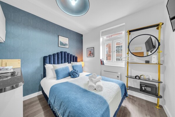 Desk, iron/ironing board, travel crib, WiFi