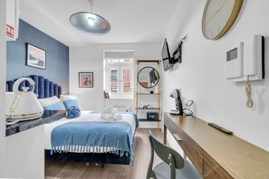 Desk, iron/ironing board, travel cot, WiFi