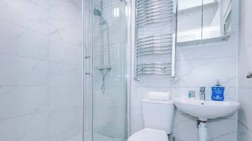 Shower, hair dryer, shampoo