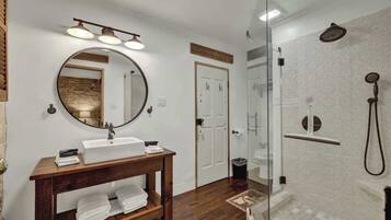 Shower, hair dryer, towels, shampoo
