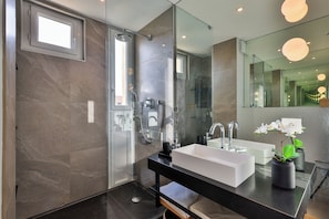 Shower, hair dryer, towels, soap