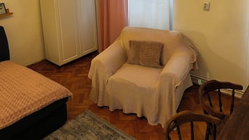 Superior Apartment | Living area | Flat-screen TV