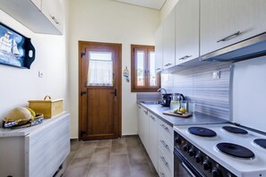 Family House, Sea View | Private kitchen | Full-size fridge, microwave, oven, stovetop