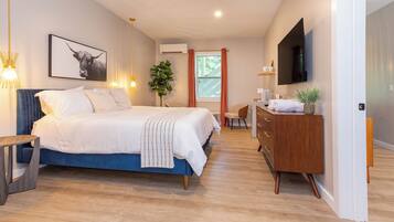 Luxury Suite, River View | Laptop workspace, blackout drapes, iron/ironing board, free WiFi