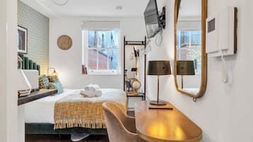 Desk, iron/ironing board, travel crib, WiFi