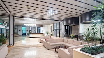 Twin Room (Twin Room Sea View) | Living room | 32-inch flat-screen TV with satellite channels