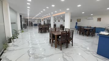 Deluxe Double Room, Balcony, City View | In-room dining