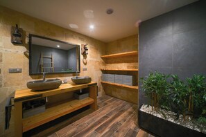 Shower, hair dryer, towels, toilet paper