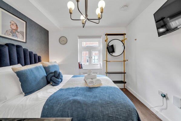 Desk, iron/ironing board, travel crib, WiFi