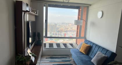 Room with view of the city in Fontibon