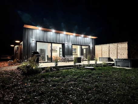 Terrace/patio. Reid's Cove Retreat, A Modern Couple's Retreat