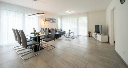 Modern Swiss Apt | spacious garden + parking + hi-speed wifi
