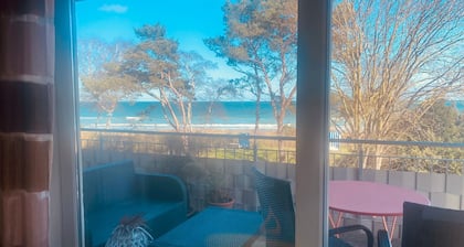 House directly on the beach, behind the dune, sea view