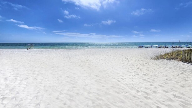 A beach with white sand and clear blue water under a bright sky. - New Golf Cart-Private Hot Tub-Walk to Beach-Charming Bungalow 4BR! (Santa Rosa Beach)