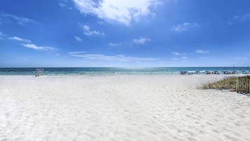 On the beach, sun-loungers, beach towels