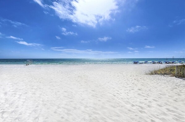 On the beach, sun-loungers, beach towels