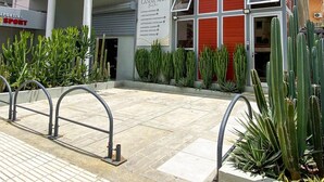 A modern building with a white facade, red shutters, and a sign indicating 'Landa Mar'. - Landa Mar Boca Chica (Boca Chica)