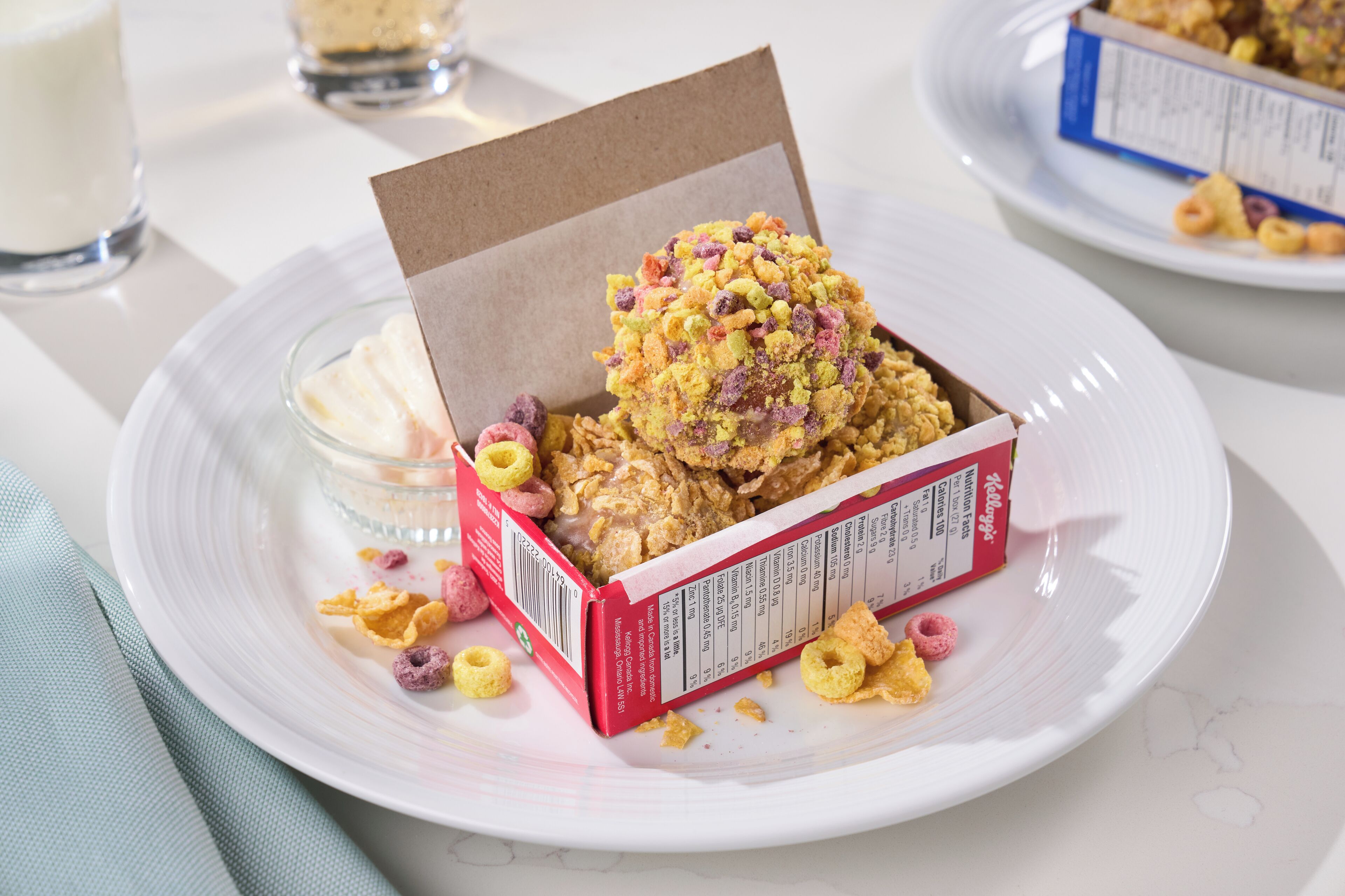 A cereal box with a nutritional label on a white plate.