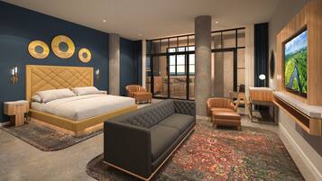 A modern bedroom with a large bed, a sofa, a TV, and a view of a cityscape through large windows.