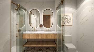 A modern bathroom with a glass-enclosed shower, a wooden vanity with two sinks, and a toilet.