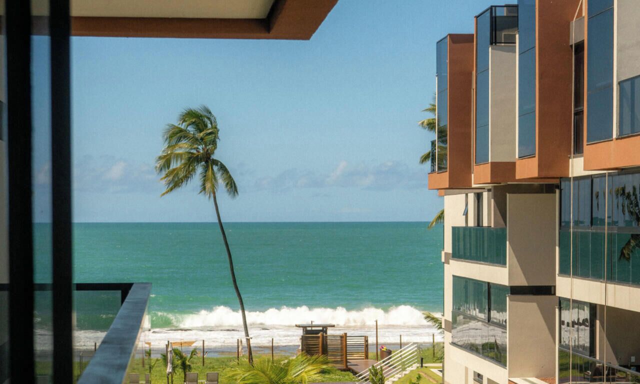 A modern building with a view of the ocean.