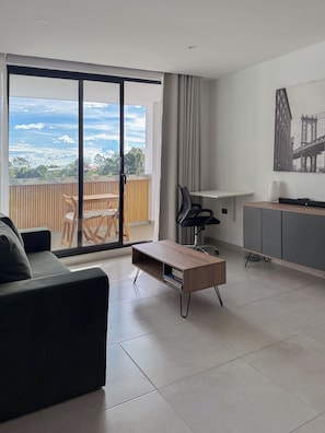 Comfort Apartment, Balcony, Hill View | Living area | Flat-screen TV