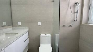 Hair dryer, towels, soap, shampoo