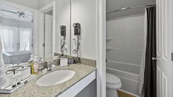 Hair dryer, towels, soap, toilet paper