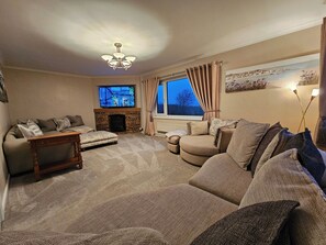 House | Living area | TV, fireplace