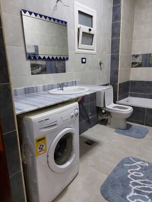 Jetted bath, hair dryer, towels, soap
