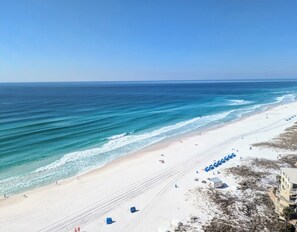 On the beach, sun loungers, beach towels