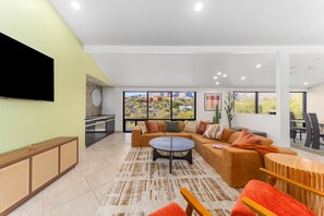 Smart TV, fireplace, books