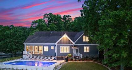 Beautiful 5 Bedroom Lake-Front Home with Heated Saltwater Pool, Spa, and Dock