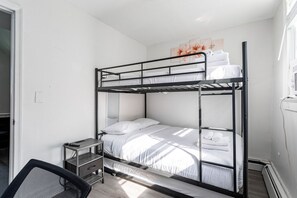 4 bedrooms, desk, iron/ironing board, travel cot