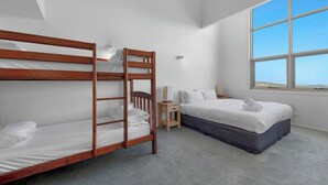 A bunk bed room with a single bed and a nightstand. - White Crystal 209- ski-in ski-out (Mount Hotham)