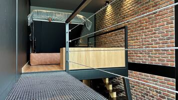 Deluxe Duplex | 1 bedroom, hypo-allergenic bedding, pillowtop beds, in-room safe
