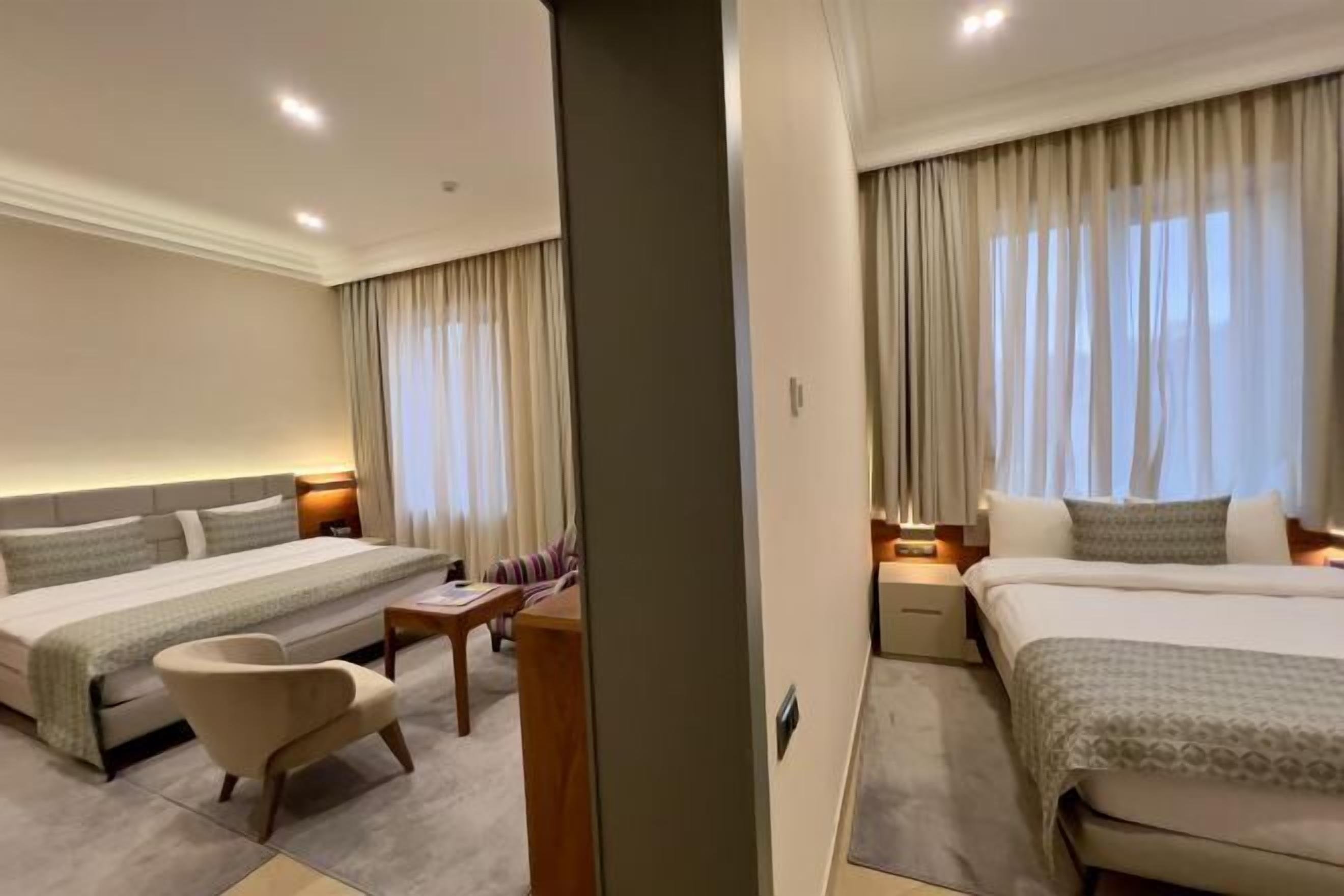 Premium bedding, memory-foam beds, in-room safe, desk