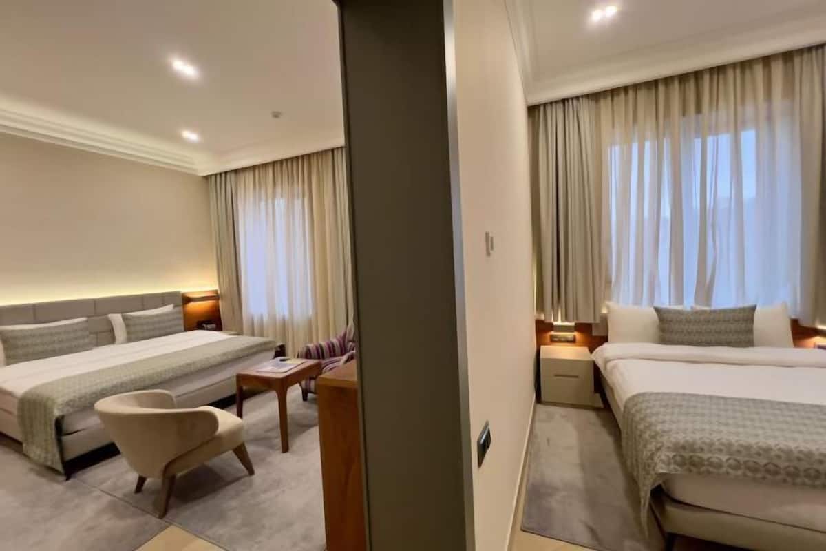 Premium bedding, memory-foam beds, in-room safe, desk