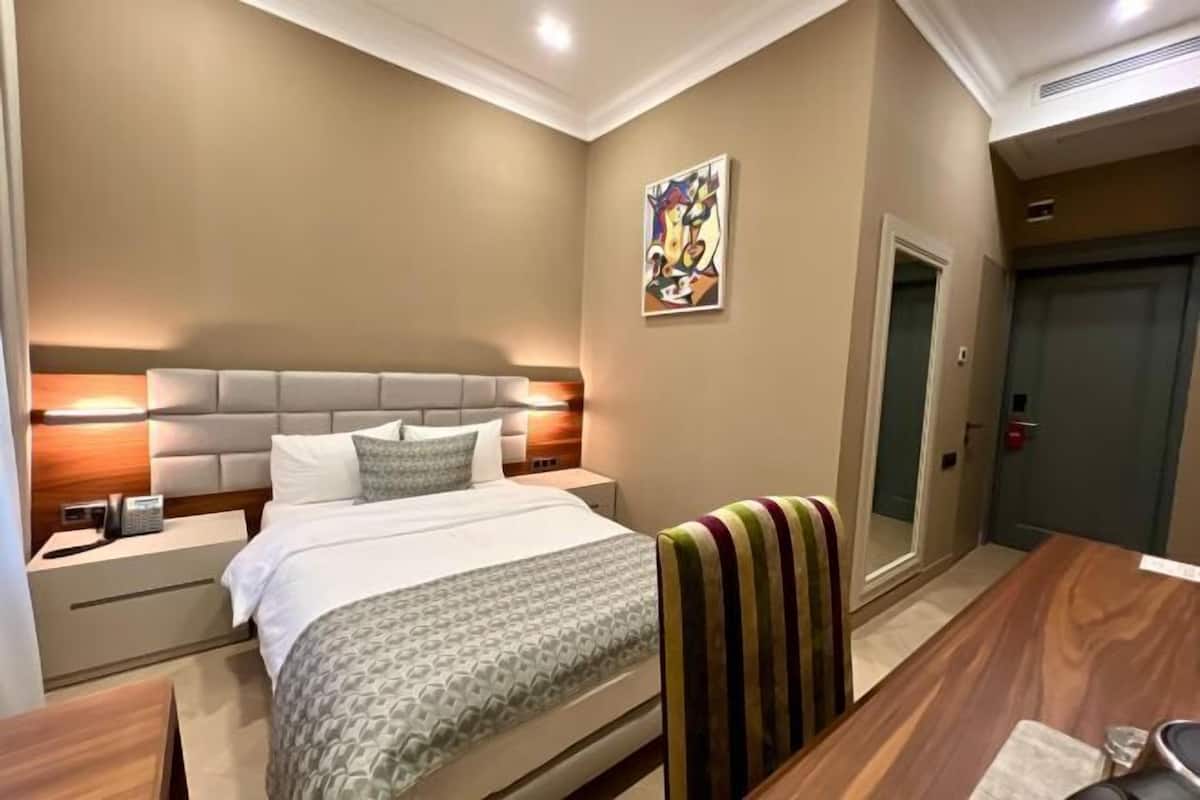 Premium bedding, memory-foam beds, in-room safe, desk