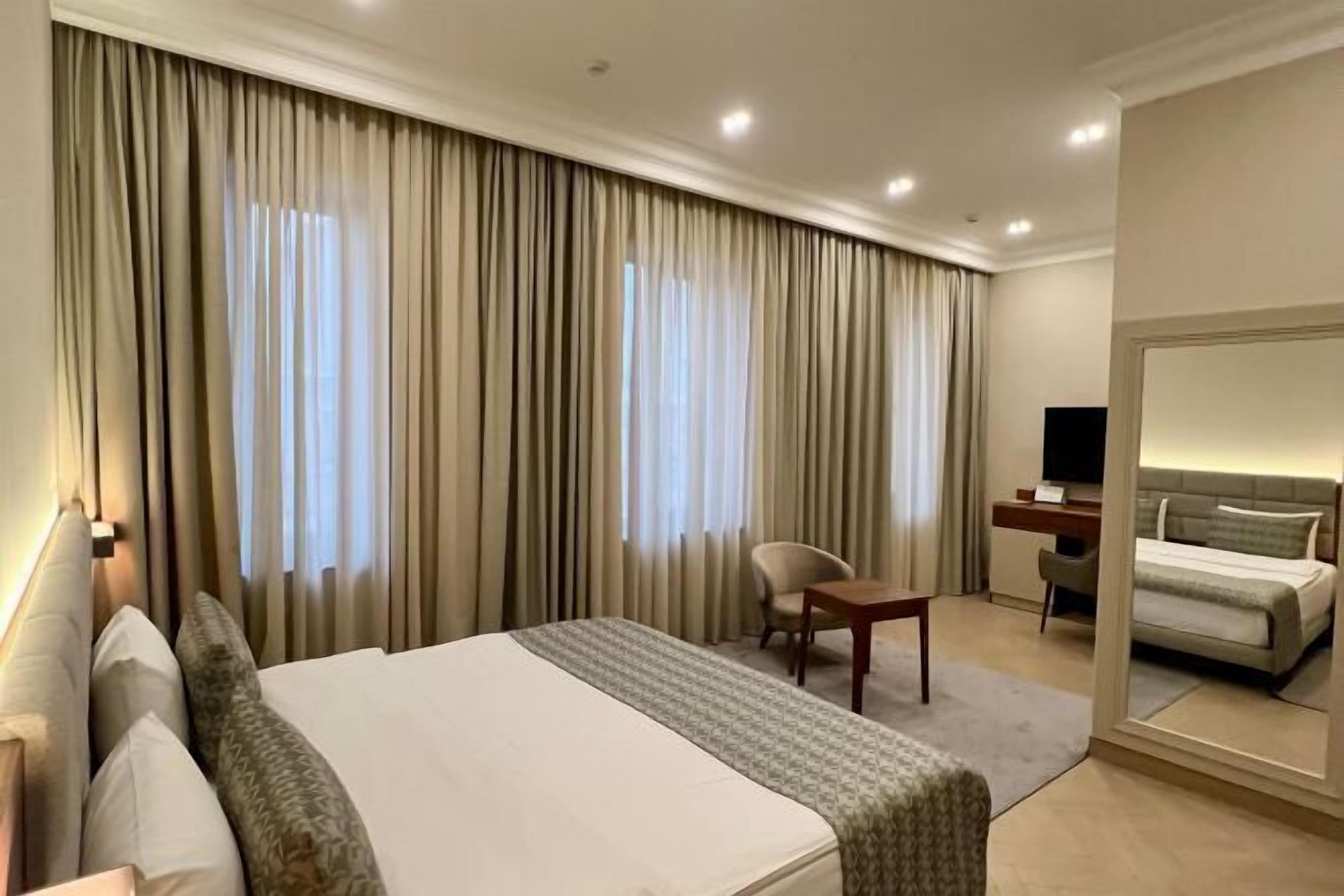 Premium bedding, memory-foam beds, in-room safe, desk