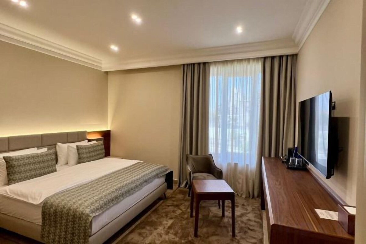 Premium bedding, memory-foam beds, in-room safe, desk