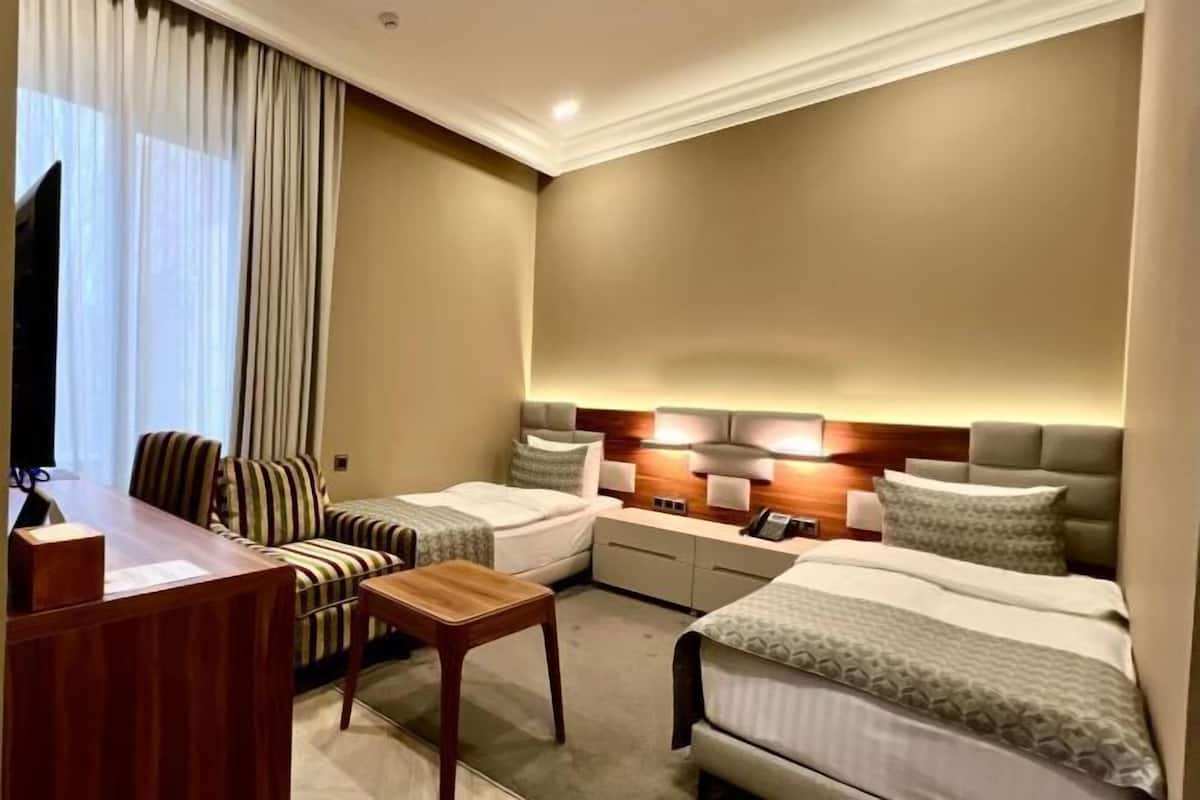 Premium bedding, memory-foam beds, in-room safe, desk