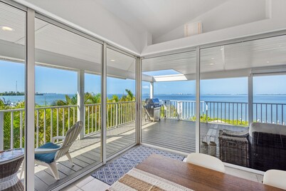 Stunning waterfront retreat w/ panoramic view, spectacular sunsets & Heated pool