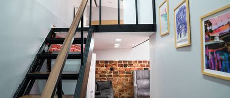 Triple Room, City View | Living area | TV, printers